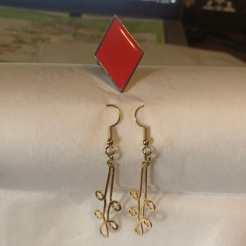 Gold costume drop earrings and vibrant red costume ring 💍